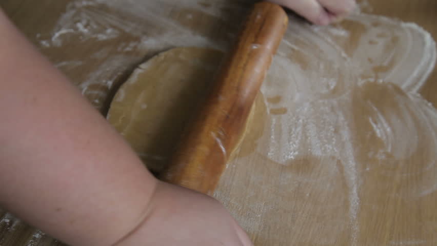 The process of baking gingerbread at home. Rolling of dough | Shutterstock HD Video #19557271