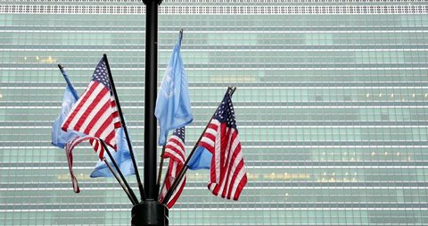 NEW YORK CITY - CIRCA MAY, 2015: Flags in front of United Nations building in New York. UN is a peace keeping organization with 193 member states.