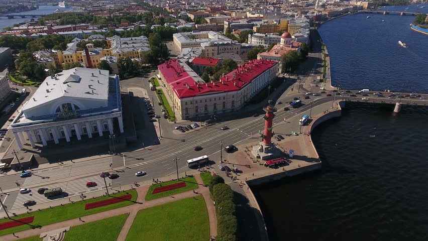 Old Saint Petersburg Stock Exchange, Birzhevoy Bridge (Exchange Bridge) are in the Vasilyevsky island. Aerial view. The Neva river, St. Petersburg, Russia