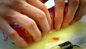 Sushi chef hands forming rolls for plating 4k video in sushi restaurant kitchen. Asian japanese cuisine.