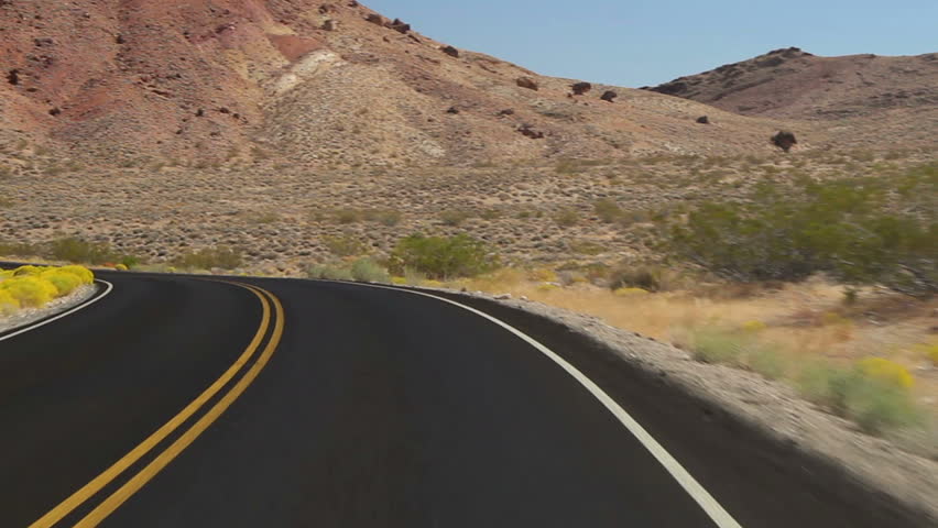 Driving shot on an empty road in Death Valley National Park.  | Shutterstock HD Video #1956586