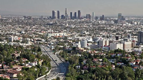 Los Angeles city view with traffic on freeway 