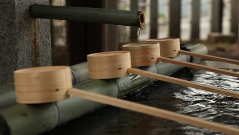water fountain, for washing hands and drinking usually found in parks and shrines in japan