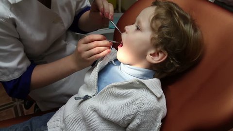 Brave kid on the reception at the dentist