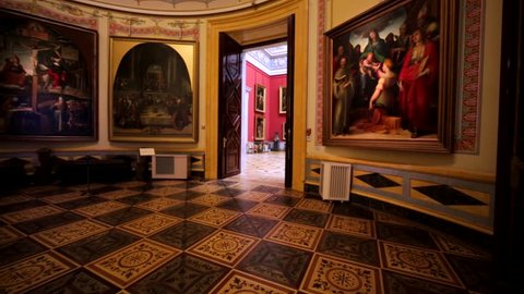 SAINT PETERSBURG, RUSSIA - FEBRUARY 12, 2016: Amazing halls with pictures and huge vases in Hermitage, one of the largest museums in the world, founded in 1764 by Catherine the Great