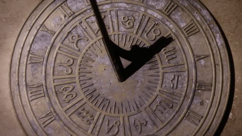 Sundial timelapse, time passing over old clock face