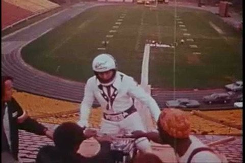 Evel Knievel performs an impressive stunt jump over a line of cars while Peter Fonda narrates in this motorcycle safety film from 1973. (1970s)