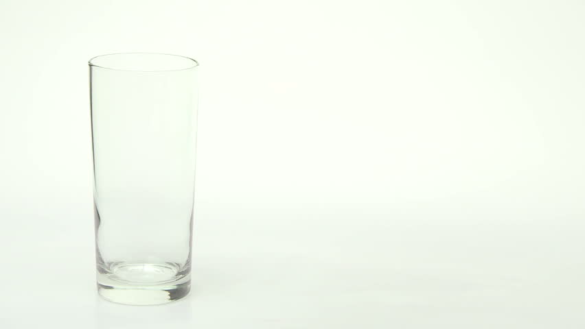 Fresh milk poured into a tall glass