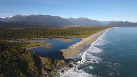 Spectacular aerial shot of Bruce Bay and the Southern Alps, New Zealand
