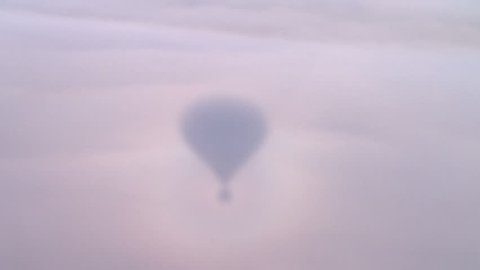 Top view of hot air balloon flying in winter