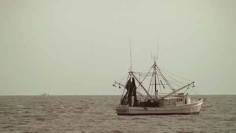 Edisto Island, South Carolina: 9/14/16.  A shrimp boat getting ready to dock ahead of Tropical Storm Julia.