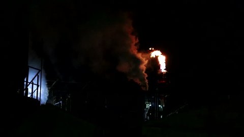 modern factory flare stack night view