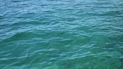 Blue water flowing pattern, filmed from boat