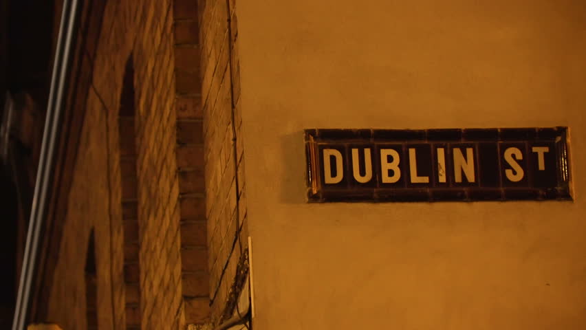The sign Dublin St. on the wall of the house indicating that is the Dublin St in Northern Ireland
