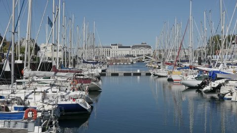 DEAUVILLE, FRANCE - SEPTEMBER 2016: Beautiful rich people port of northern French city with luxurious yachts and boats by the day