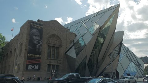 Toronto, Canada - CIRCA: September 2016: Busy Toronto intersection in front of Royal Ontario Museum ROM tourism day people