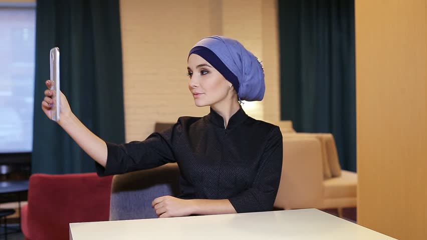 Young Muslim Girl Use Tablet