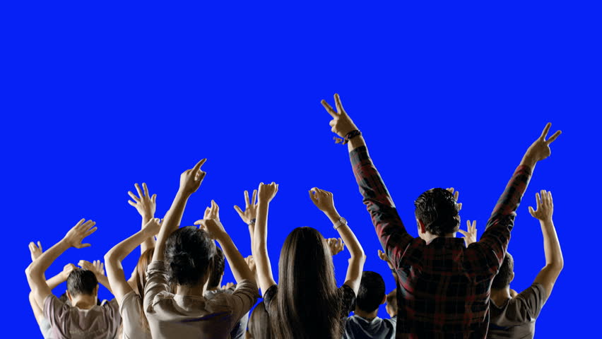 4K Crowd of fans dancing on blue screen. Concert, Jumping, Dancing, Hands up. Slow motion. Shot on RED EPIC Cinema Camera.
