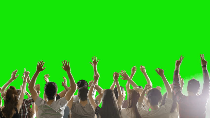 Crowd of fans dancing on green screen. Concert, Jumping, Dancing, Hands up. Slow motion. Shot on RED EPIC Cinema Camera