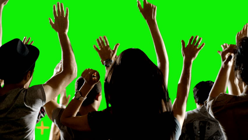 Crowd of fans dancing on green screen. Concert, Jumping, Dancing, Hands up. Slow motion. Shot on RED EPIC Cinema Camera