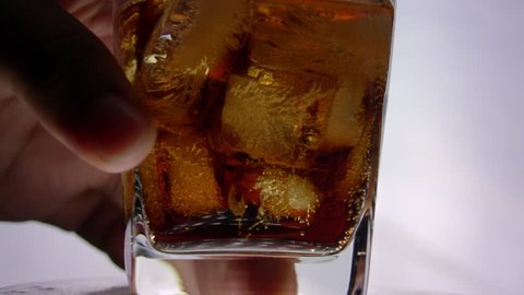 Putting Coke with Ice in Whiskey Glass on Bar bench White ( 4K )