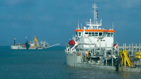 Two offshore special purpose ships working on the field. 