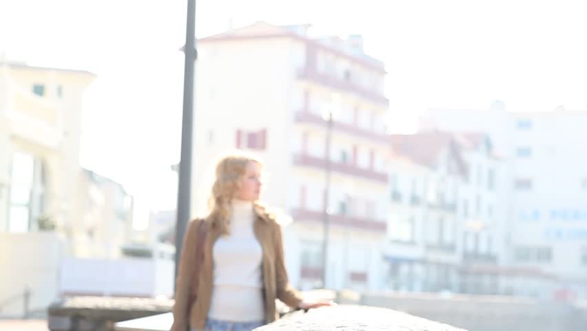Woman walking outside in town