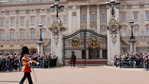 LONDON, ENGLAND - April 27, 2016 - 4k footage of the changing of the guard at Buckingham Palace, London, United Kingdom.