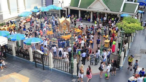 BANGKOK, THAILAND - SEPTEMBER 9,2016 : . People come to worship and pay respect to the Erawan Shrine located at Grand Hyatt Erawan Hotel (Ratchaprasong Junction) in Bangkok, Thailand 