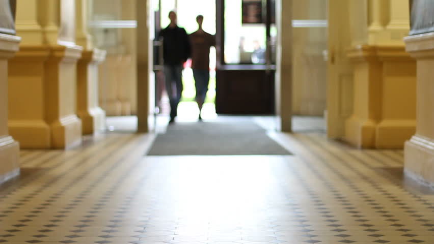 Students enter university hallway