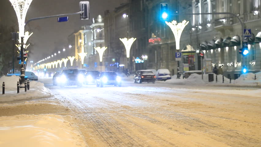 City traffic in snowfall