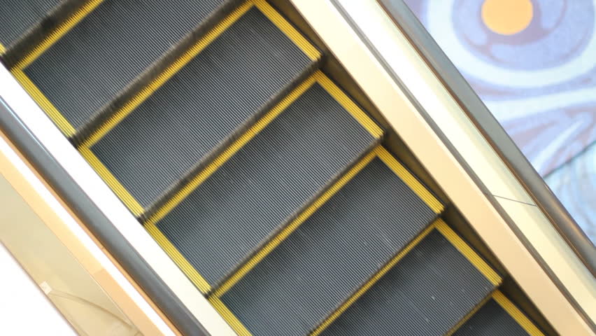 Top view of man on escalator