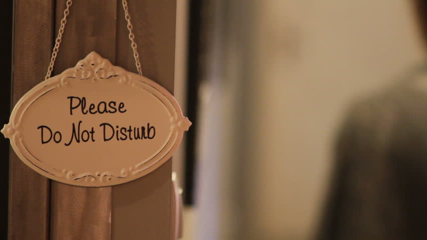 Please do not disturb sign in a hotel