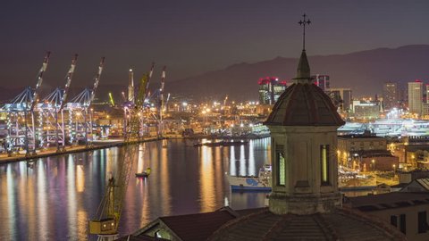 GENOA, ITALY-AUGUST, 2016: a sunset time-lapse of Genoa's port from rooftop.