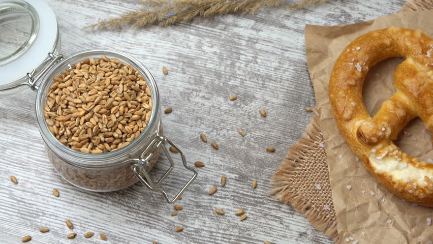 Tabletop view of brezels on the kitchen table. Healthy eating and traditional bakery concept. Prores 4k.
