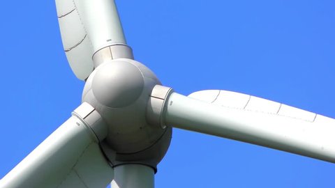 4K footage of wind turbines (aerofoil-powered generators) creating renewable energy. Arrays of large turbines, known as wind farms, are becoming an increasingly important source of renewable energy.