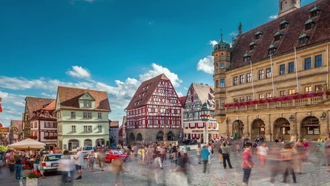 ROTHENBURG OB DER TAUBER, GERMANY - JULY 29, 2016: Hyperlapse video of Main square in old town Rothenburg ob der Tauber, Bavaria, Germany. Timelapse view in 4K.