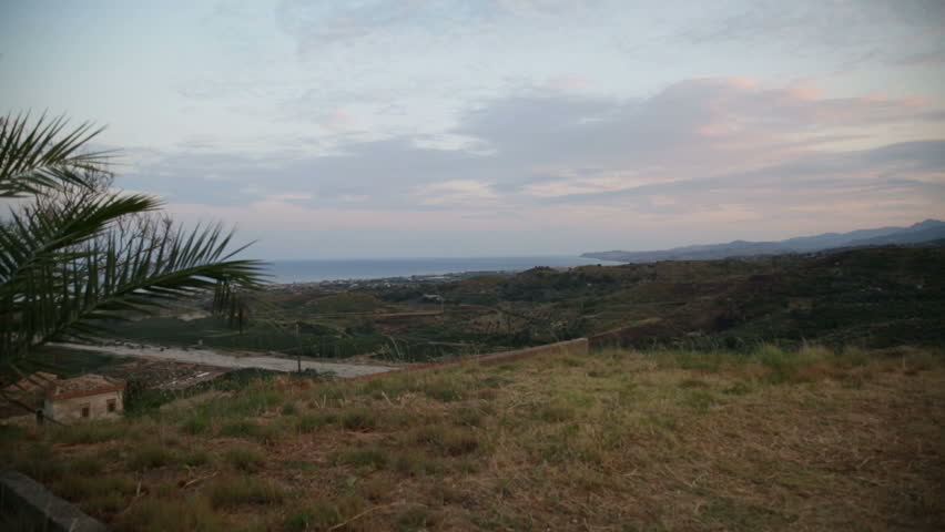 Pan of Some Mountains at the Sunset. 