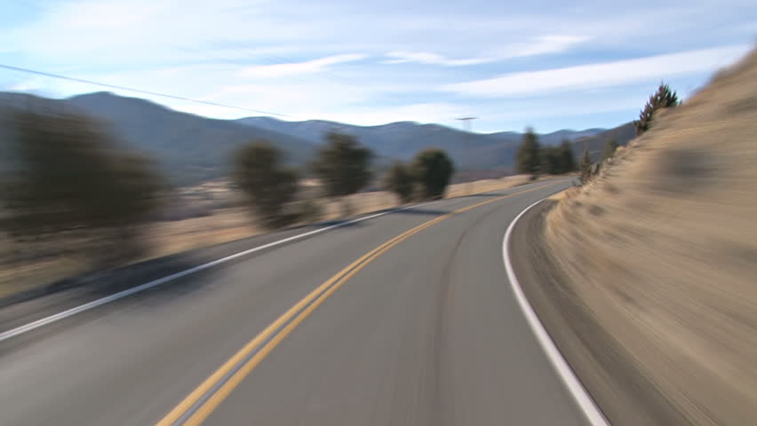 Point of view time lapse of driving west on country road in Northern California
