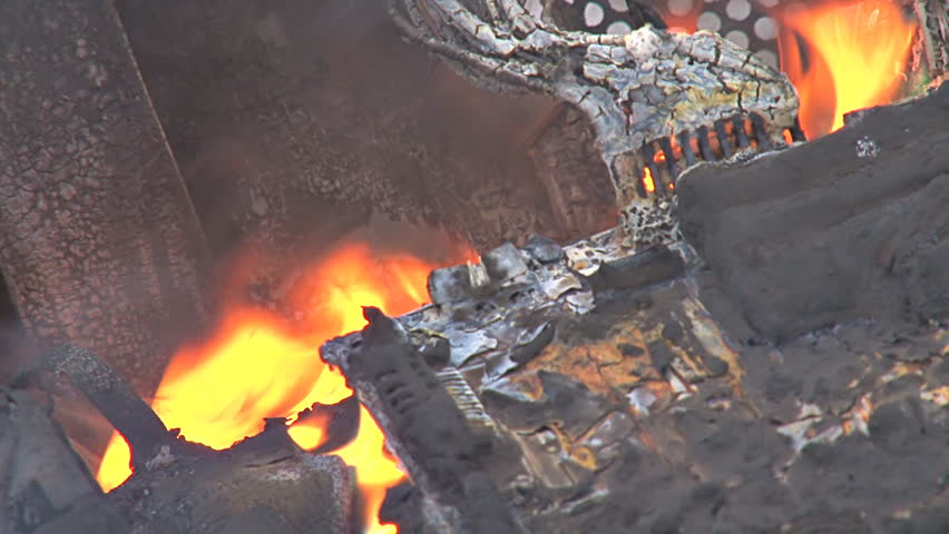 Apocalyptic view of the charred and flaming innards of a dead computer