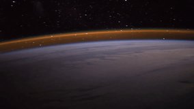 Earth and Aurora Borealis seen from ISS. Beautiful Planet Earth observed from space. Elements of this video furnished by NASA.