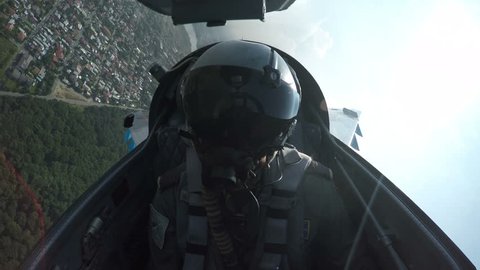 POV shot from the cockpit of a fighter plane