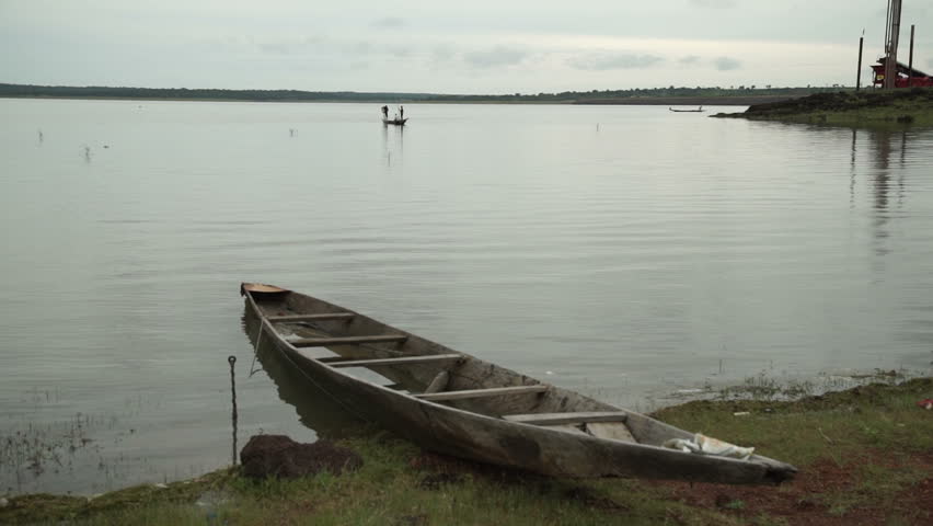 Fishermen on a lake in Mali, Africa.
A beached boat on shore.
About Africa, Mali, developing countries, poverty, third world