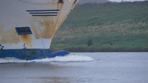 Bow of a Ro-Ro cargo vessel underway. Close up panning shot from the Bulb in 4k.