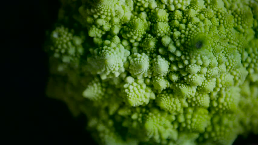 green cauliflower romanesco rotate on the black background / sony fs7 Royalty-Free Stock Footage #19815460