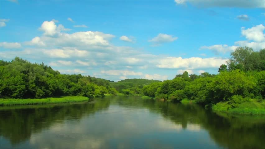 clouds over the summer river, timelapse