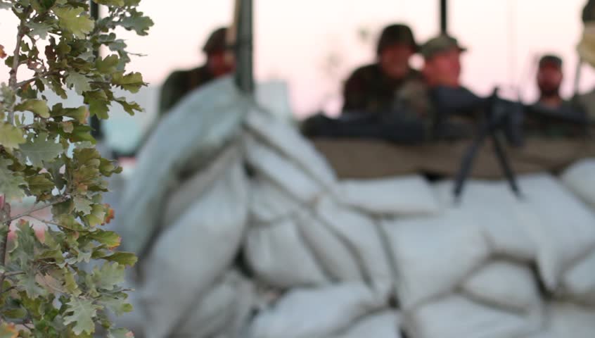 Soldiers on the defensive points. US Soldiers on establishing defensive positions and defending terrain