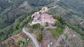 Aerial shot, gorgeous classic small tuscany village on the hill flyover, made with drone