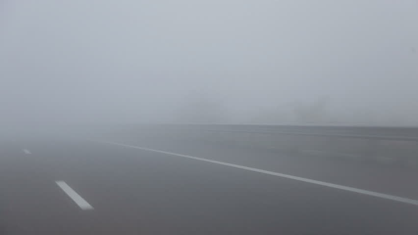 A foggy road Royalty-Free Stock Footage #19834183