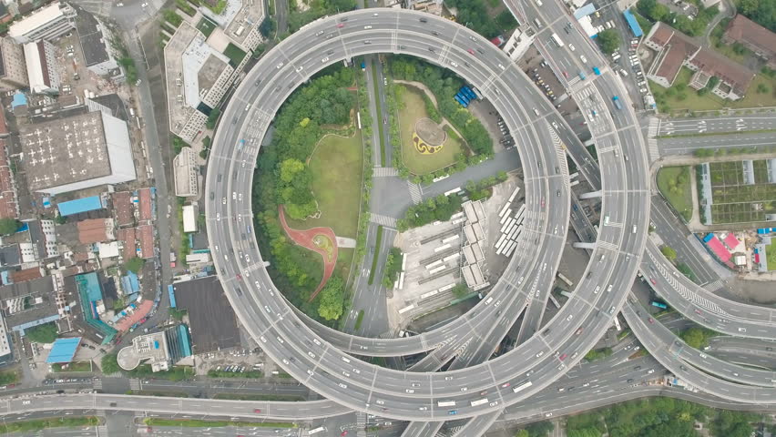 Overhead aerial view of the circular shaped Nanpu highway, one of the most iconic elevated highways, located in Shanghai, China. Royalty-Free Stock Footage #19836121